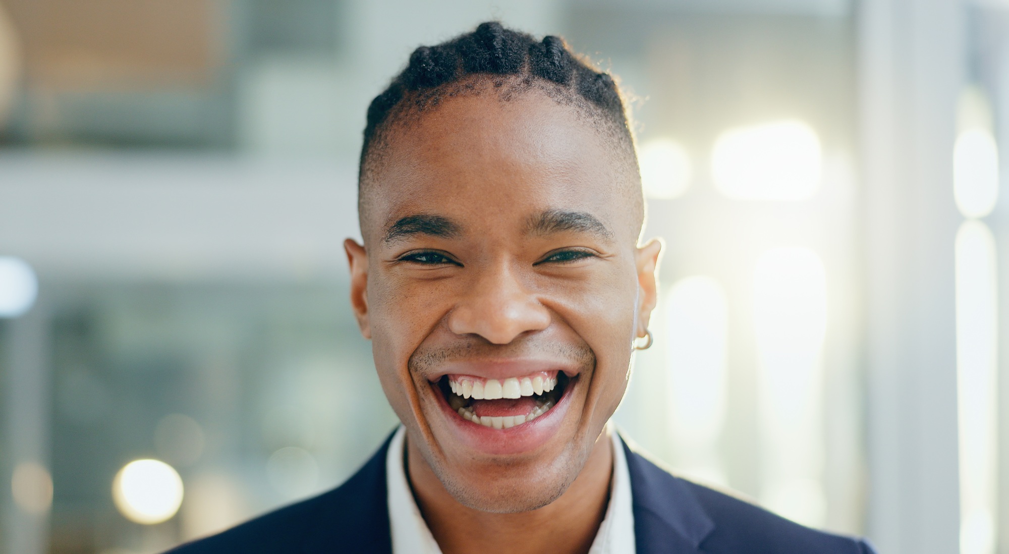 Black man, business portrait and smile in office for company about us or profile picture and excite