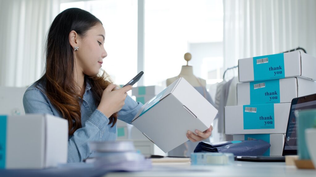 Young asia people woman female e-commerce smart parcel work check send post